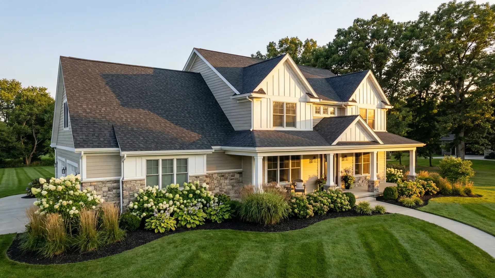 Two-story suburban home with a clean asphalt shingle roof